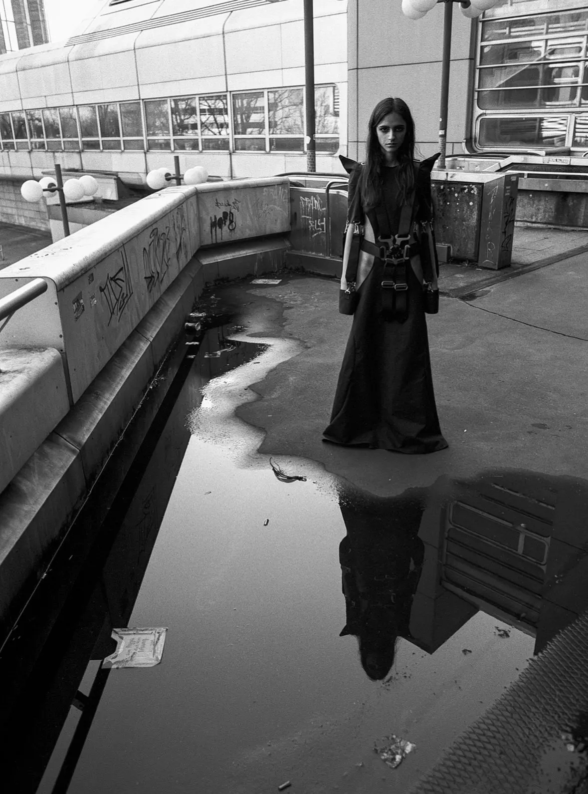 Racing 6-Point Belt Dress — model by the water, black and white