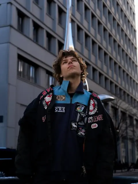 Lennart Wobig, founder and designer of GÖRE, in a patched bomber jacket in Berlin