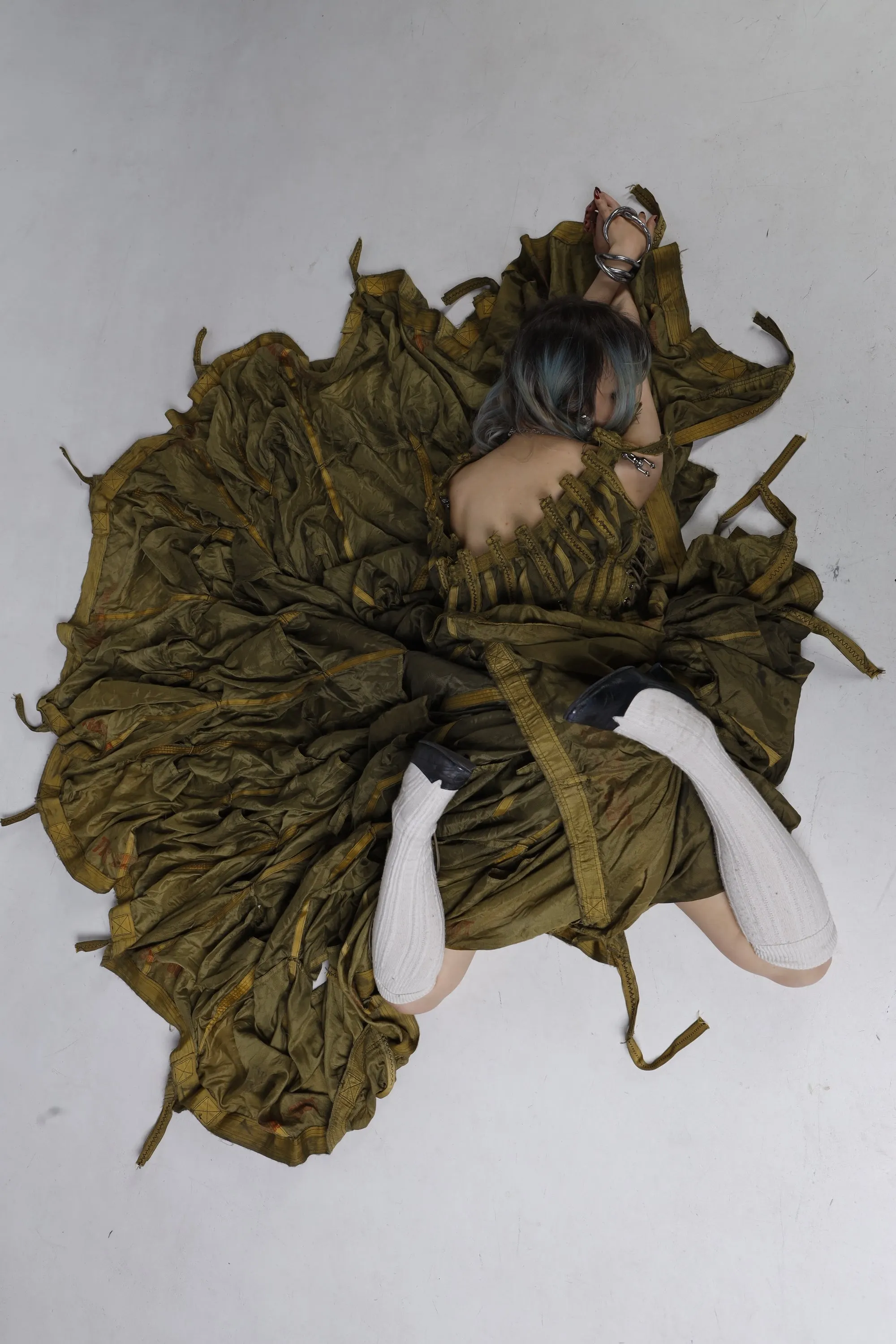 Parachute Dress — model wrapped inside the parachute canopy